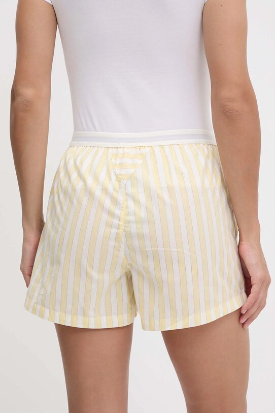 Βαμβακερό σορτσάκι Tommy Hilfiger UW0UW05765 κίτρινο SS25
