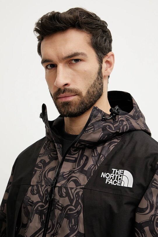 Μπουφάν The North Face TNF X NSE καφέ NF0A8C6ZAC91