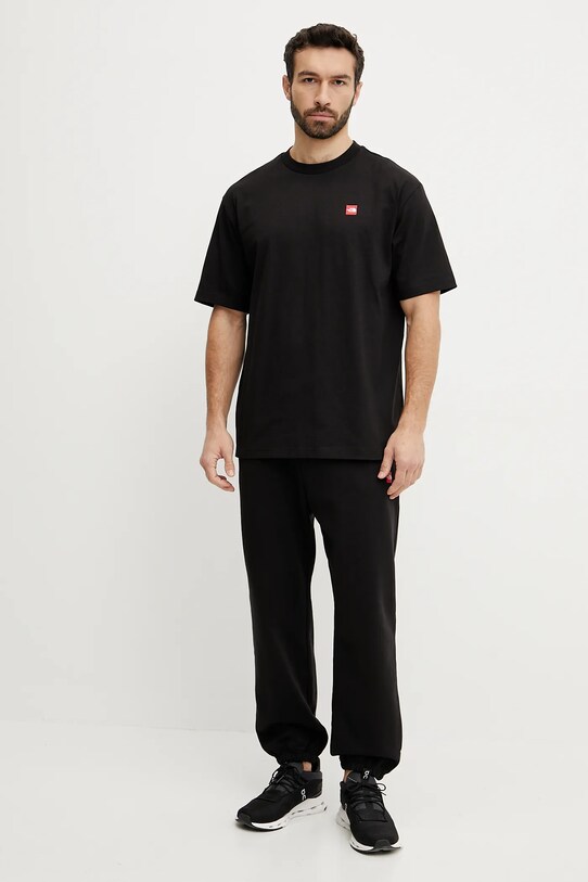 Βαμβακερό παντελόνι The North Face Axys NF0A8C1UJK31 μαύρο SS25