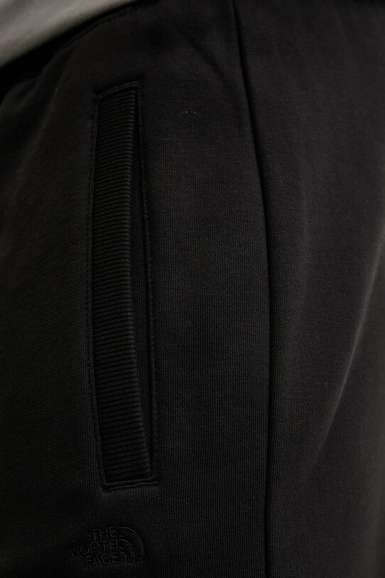 Βαμβακερό παντελόνι The North Face Dome Relaxed μαύρο NF0A8C3SJK31